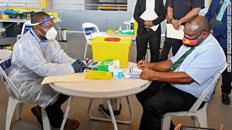 Papua New Guinea&#39;s Prime Minister James Marape prepares to receive a dose of the AstraZeneca Covid-19 vaccine in Port Moresby.