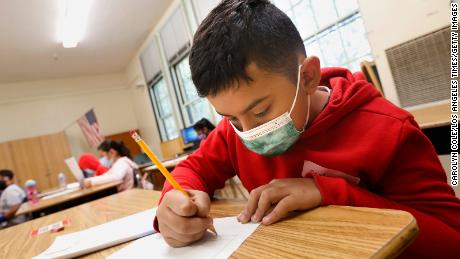 Los Angeles, CaliforniaJune 23, 2021Arnold Madris, age 9, is one of the students in teacher Dorene Scala third grade summer school class at Hooper Avenue School on June 23, 2021. Students must wear a mask throughout the day. (Carolyn Cole / Los Angeles Times via Getty Images)