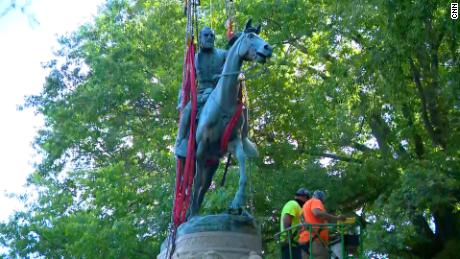 Charlottesville removes two Confederate statues as onlookers cheer