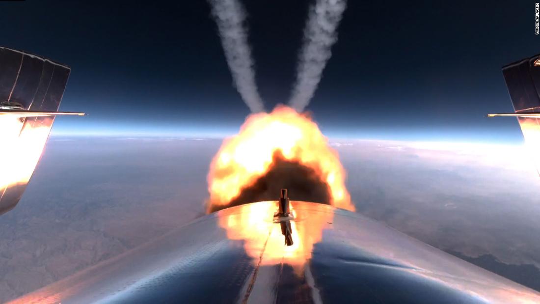 The VSS Unity&#39;s rocket burns during the flight.