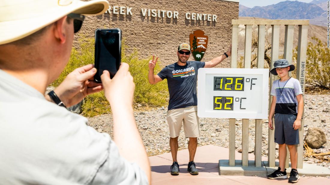 Visitors take photos in front of a thermometer July 10 at Death Valley National Park in Death Valley, California. Death Valley is known to be a hot place, but on July 9 &lt;a href=&quot;https://www.cnn.com/2021/07/11/weather/weather-death-valley-heat-record-california-weekend/index.html&quot; target=&quot;_blank&quot;&gt;it hit 130 degrees Fahrenheit&lt;/a&gt; for only the fifth time in recorded history.