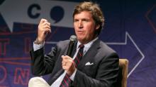 LOS ANGELES, CA - OCTOBER 21:  Tucker Carlson speaks onstage during Politicon 2018 at Los Angeles Convention Center on October 21, 2018 in Los Angeles, California.  (Photo by Rich Polk/Getty Images for Politicon )