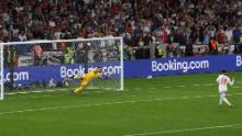 Italy's goalkeeper Gianluigi Donnarumma saves Sancho's penalty during the penalty shoot out during the Euro 2020 final.