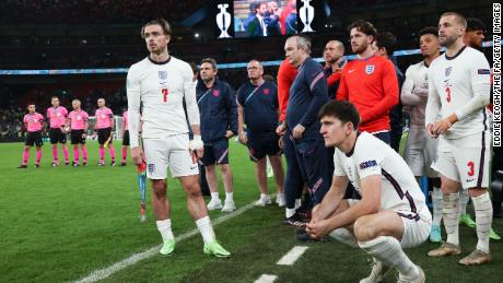 Jack Grealish and Harry Maguire look disconsolate following England&#39;s defeat.