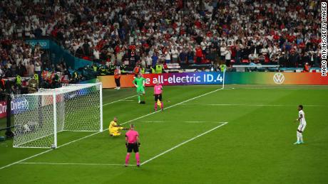 Marcus Rashford misses England&#39;s third penalty in the shootout.