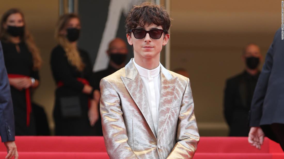 Timothée Chalamet shone in a silver Tom Ford suit and Celine sunglasses.