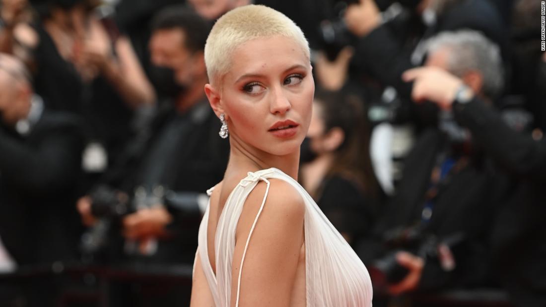 Iris Law&#39;s fresh buzz cut was given the black tie treatment at Cannes, as she donned a Grecian-looking Dior gown.