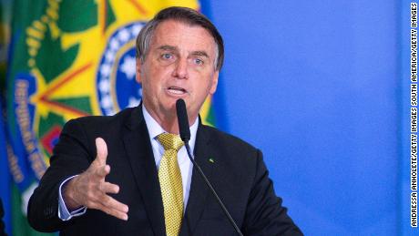 Jair Bolsonaro admitted to hospital after abdominal pain and hiccups - CNN