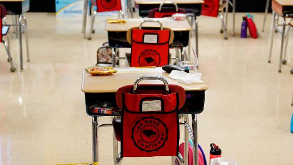 FILE - In this Thursday, March 11, 2021 file photo, desks are arranged in a classroom at an elementary school in Nesquehoning, Pa. In the fall of 2021, vaccinated teachers and students should no longer wear masks inside school buildings and no one need bother with them outside, the Centers for Disease Control and Prevention said Friday, July 9, 2021, in relaxing its COVID-19 guidelines. (AP Photo/Matt Slocum, File)