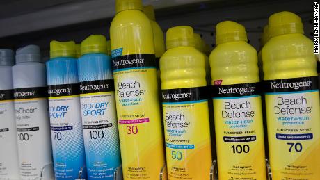 Neutrogena sunblock, from Johnson &amp; Johnson, is displayed in a pharmacy, Thursday, July 16, 2020, in New York. Johnson &amp; Johnson beat Wall Street&#39;s second-quarter expectations and bumped up its 2020 forecast even though COVID-19 chopped medical device revenue nearly 40 percent. (AP Photo/Mark Lennihan)