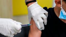 A boy receives a dose of the Pfizer/BioNTech Covid-19 vaccine at the Clalit Healthcare Services in the Israeli city of Holon near Tel Aviv on June 21, 2021, as Israel begins coronavirus vaccination campaign for 12 to 15-year-olds. - Israel is now urging more 12- to 15-year-olds to be vaccinated, citing new outbreaks attributed to the more infectious Delta variant. (Photo by JACK GUEZ / AFP) (Photo by JACK GUEZ/AFP via Getty Images)