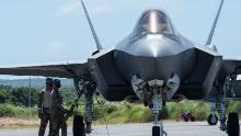 US Air Force airmen perform hot-pit refueling on an F-35A fighter at Northwest Field as part of an Agile Combat Employment (ACE) on Guam in February.