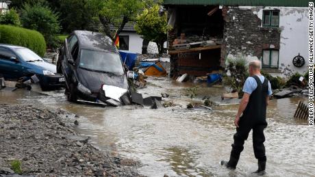 A resident of North-Rhine Westphalia examines the damage on Thursday.