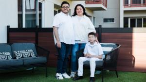 Daniel Trujillo with his parents Lizette and José at their home on May 24 in Tucson, Ariz.