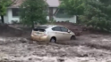 Watch car get swept away in AZ flash floods