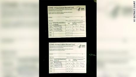 The criminal complaint against Juli A. Mazi included photos of falsified vaccine cards. 