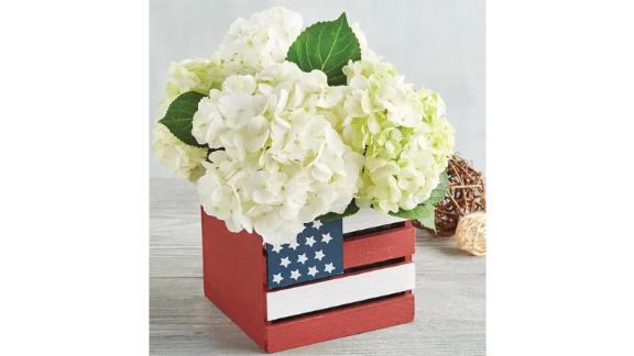 White hydrangea in American flag crate