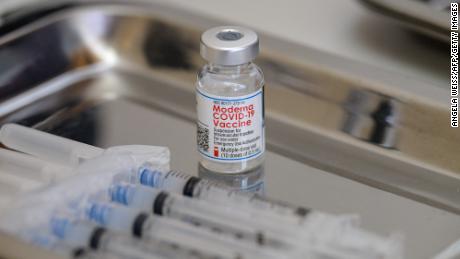 A vial of the Moderna Covid-19 vaccine and syringes sit prepared at a pop up vaccine clinic at the Jewish Community Center on April 16, 2021 in the Staten Island borough of New York City. 
