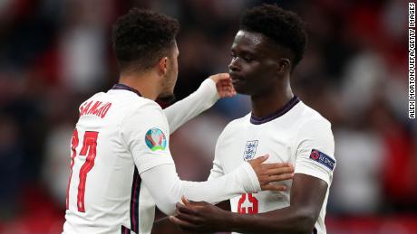 Bukayo Saka (right) and team mate Jadon Sancho (left) during the UEFA Euro 2020 Championship Group D match between Czech Republic and England at Wembley Stadium on June 22, 2021.