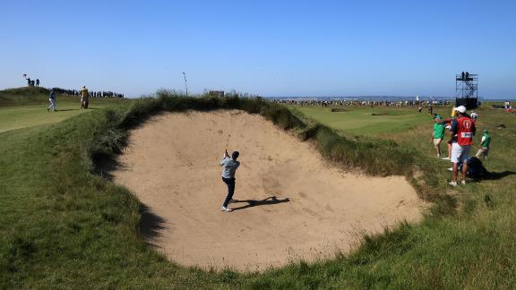 Spieth plays his second shot on the 7th hole at Royal St George's.