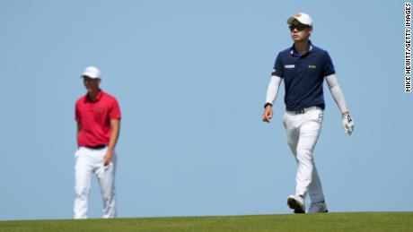 Janewattananond makes his way along the eighth hole during day three of The Open at Royal St George&#39;s.