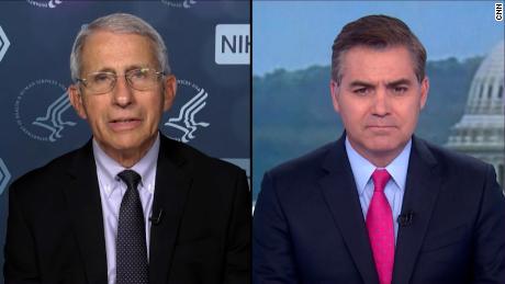 Dr. Anthony Fauci told CNN&#39;s Jim Acosta that Covid-19 vaccines are &quot;highly effective in preventing symptomatic, clinically apparent disease.&quot;