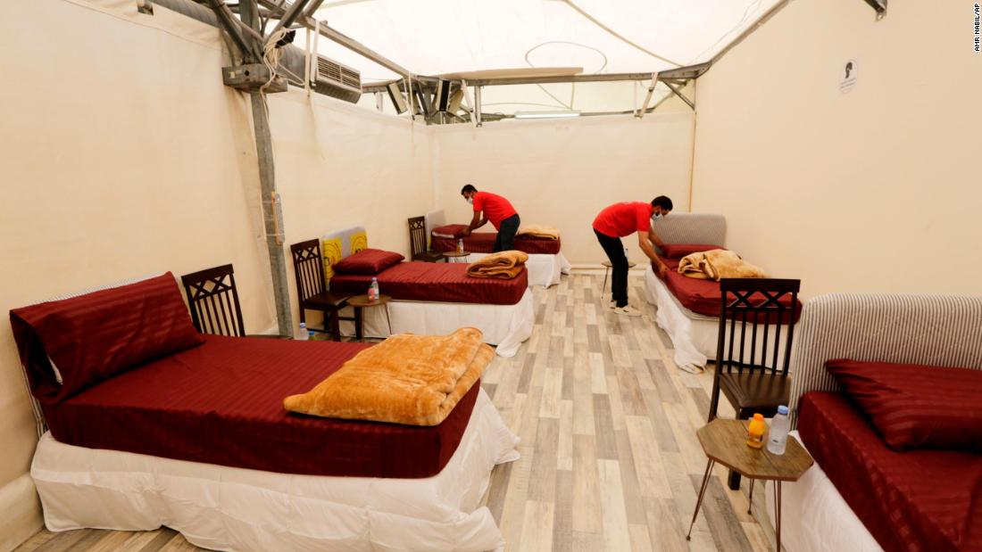 Workers set up accommodations for pilgrims at the Mina tent camp on July 12.