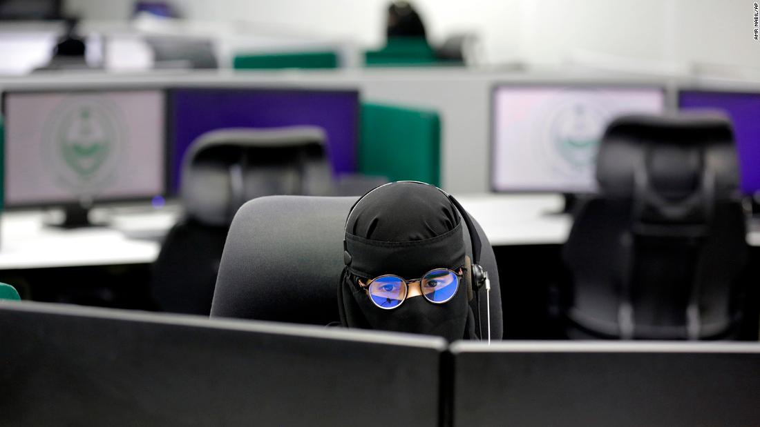 A woman receives calls July 14 at the National Center for Security Operations in Mecca.