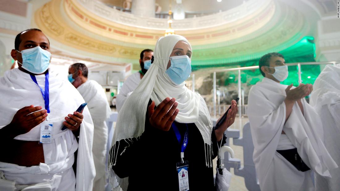 Pilgrims pray in front of the Al-Safa mountain at the Grand Mosque on Sunday.