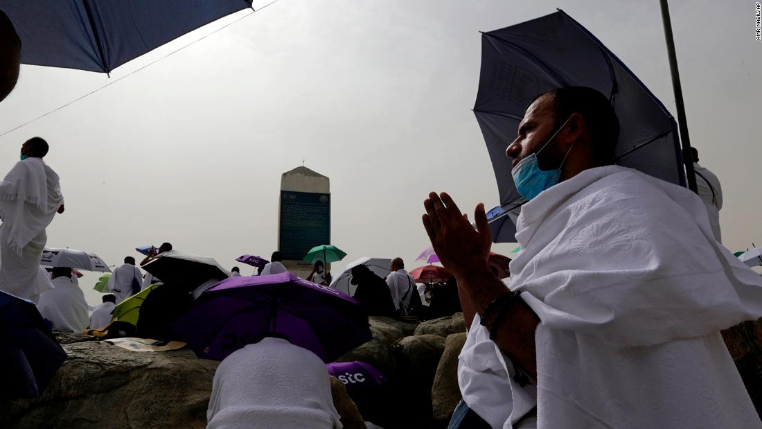 A pilgrim prays at Mount Arafat on Monday.