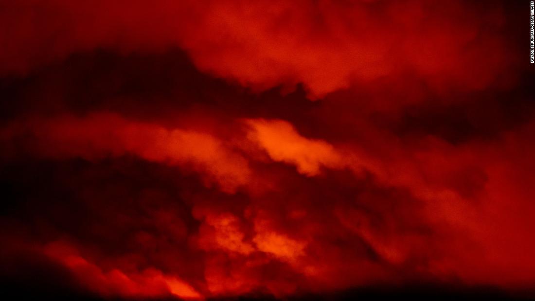 Fire from the Bootleg Fire illuminates smoke near Bly, Oregon, on the night of July 16.