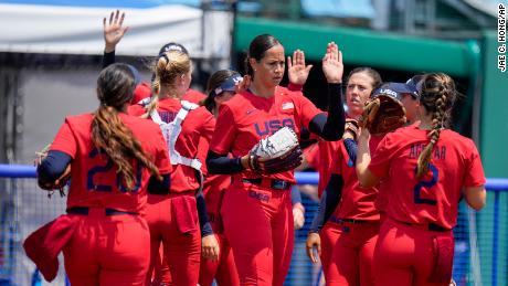 American Cat Osterman celebrates with teammates during the softball game between Italy and the US on Wednesday.
