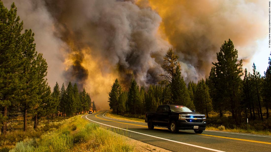 Wildfires prompt evacuations along the West Coast and hazy conditions as far as the East Coast