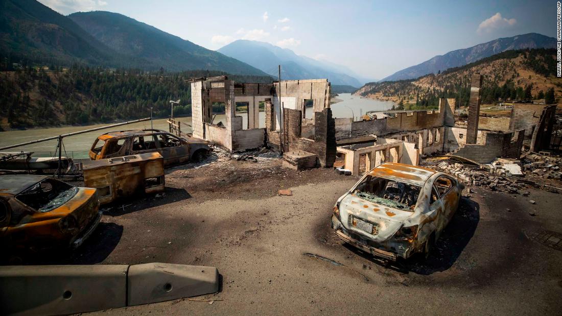 Burned cars and structures are seen in Lytton, British Columbia, on Friday, July 9, 2021.