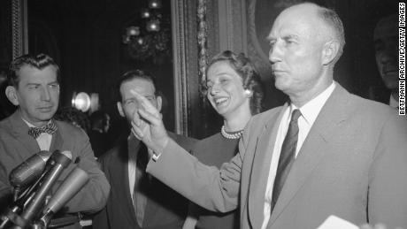 Sen. Strom Thurmond is surrounded by reporters as he steps from the Senate Chamber after ending his 24-hour filibuster against the Civil Rights Bill of 1957. 