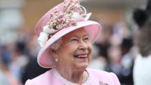 The Queen meets guests at the Royal Garden Party at Buckingham Palace in 2019. 