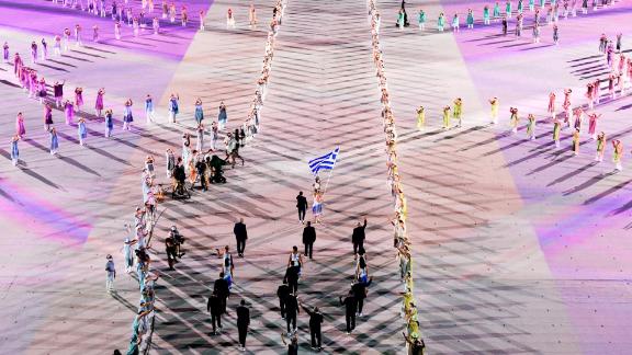 Greece's athletes march into the stadium to kick off the parade of nations.