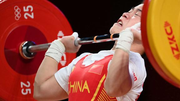 China's Hou Zhihui competes in the women's 49kg weightlifting competition during the Tokyo 2020 Olympic Games at the Tokyo International Forum on Saturday, July 24. Hou <a href=