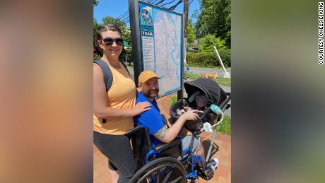 Chelsie and Jeremy use their WheeStroll Wheelchair Stroller Attachment on an outing with Phoenix.