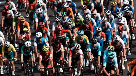 Cyclists compete in the men's road race on July 24. <a href=