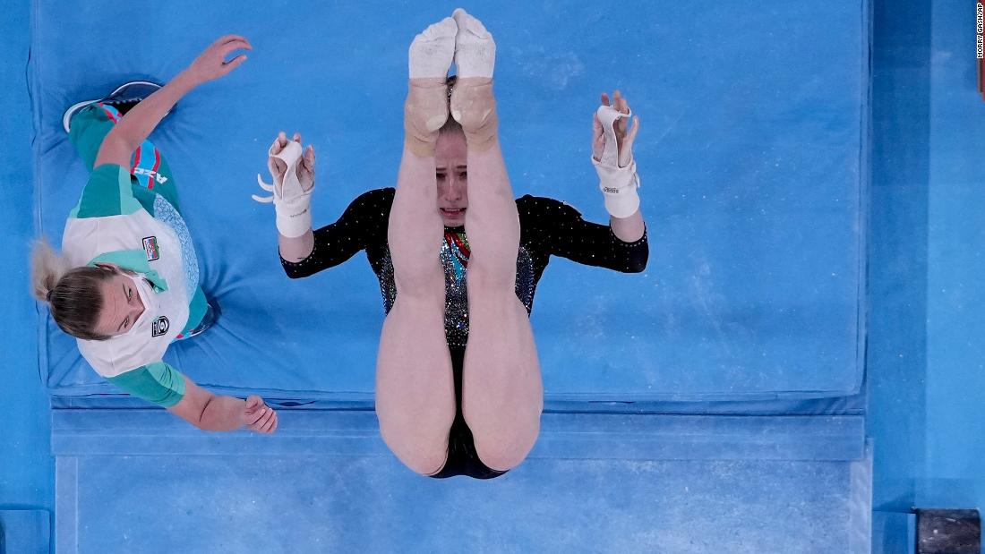 Marina Nekrasova, a gymnast from Azerbaijan, competes on the uneven bars during the qualification round on July 25.