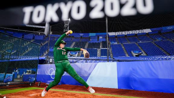 Mexico's Dallas Escobedo warms up before a softball game against Italy on July 25. Softball is back at the Olympics for the first time since 2008.