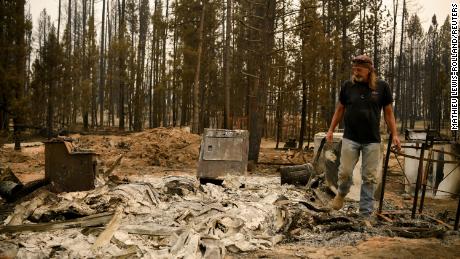 Scott Griffin surveys his property which was destroyed by the Bootleg Fire, in Sycan Estates, Oregon, U.S on July 24.