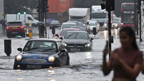 Thunderstorms flooded roads and parts of the Underground rail system in London on Sunday, July 25.