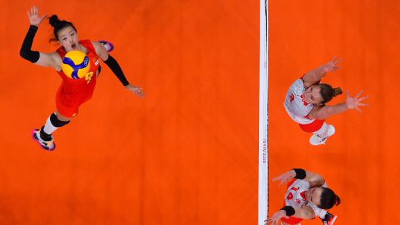 China's Zhang Changning spikes the ball in a preliminary-round volleyball match against Turkey on July 25.