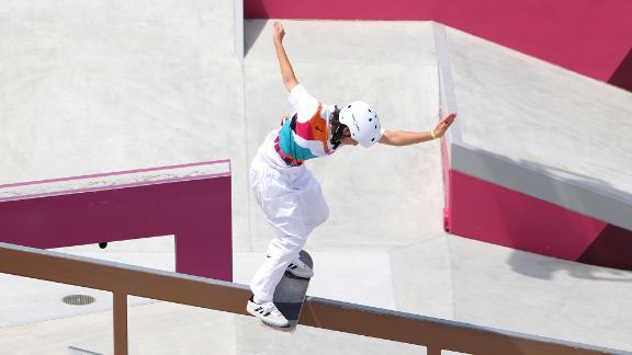 Japanese skateboarder Momiji Nishiya grinds a rail during the women's street competition on July 26. The 13-year-old <a href=