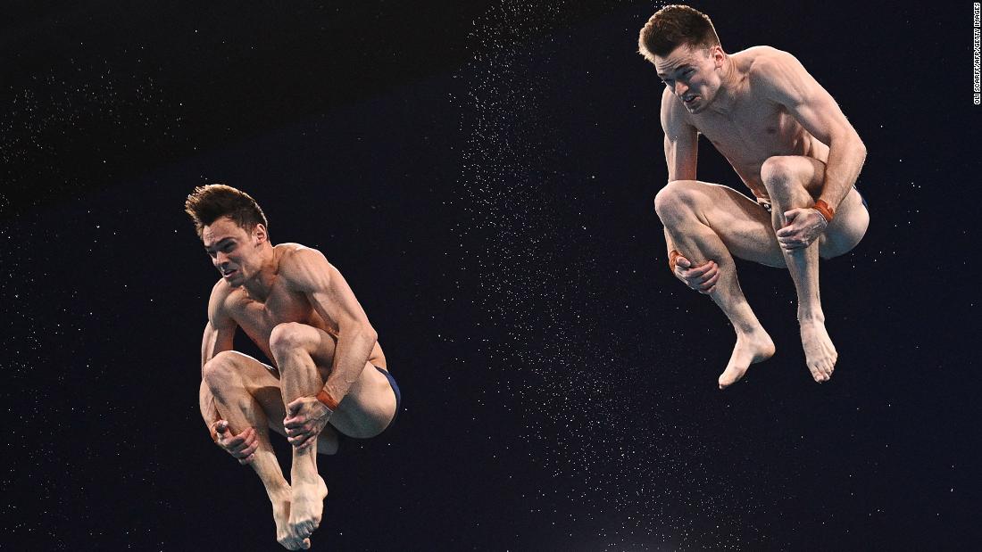 British divers Tom Daley, left, and Matty Lee compete in the synchronized 10-meter platform event on July 26. They won the gold.