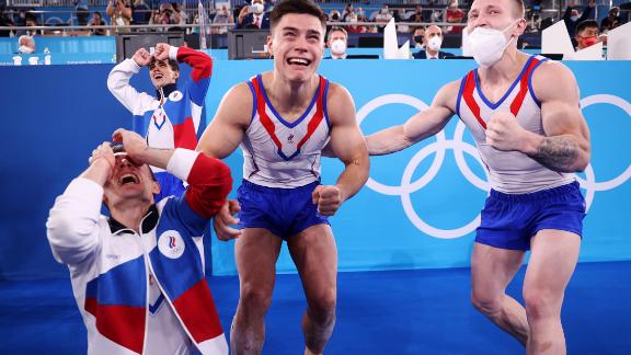 From left, Russian gymnasts David Belyavskiy, Artur Dalaloyan, Nikita Nagornyy and Denis Ablyazin react after <a href=