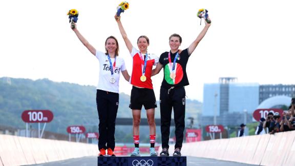 Kiesenhofer (middle) plans to lecture at her university next semester, where colleagues and students know her for her achievements on the track. 