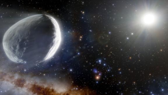 Questa illustrazione mostra la cometa Bernardinelli-Bernstein come potrebbe apparire nel sistema solare esterno. 